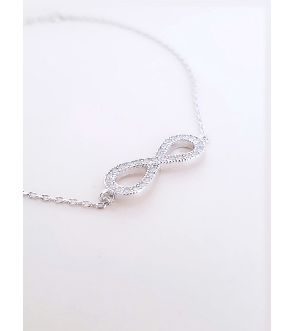 Bracelet "infini" en argent 925/1000ème rhodié et oxyde de zirconium
