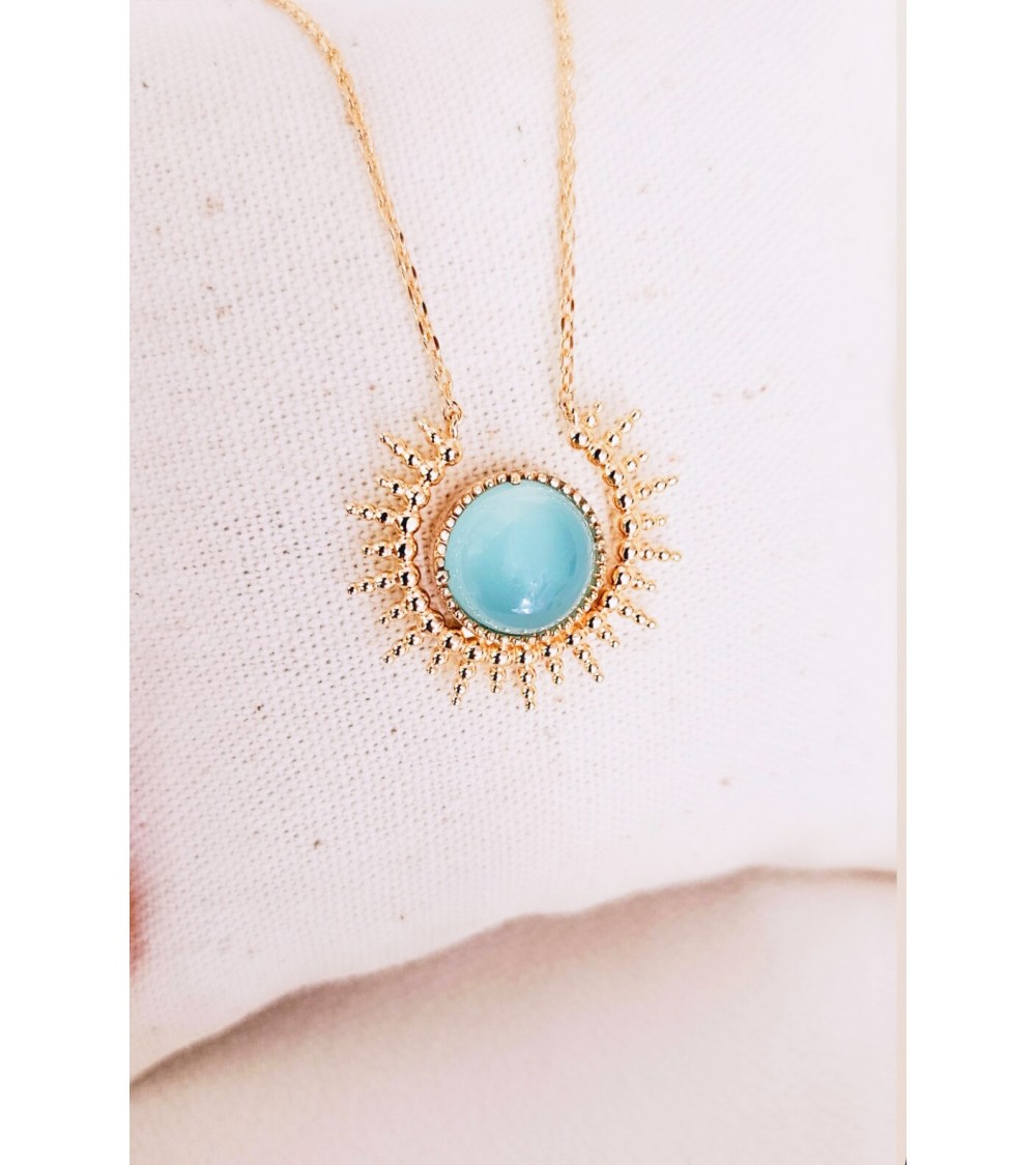 Collier 3/4 "soleil" en plaqué or, agrémenté d'une pierre agate bleue