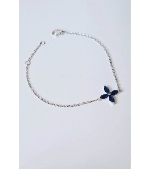 Bracelet "fleur" en argent 925/1000 rhodié et verre couleur bleu saphir