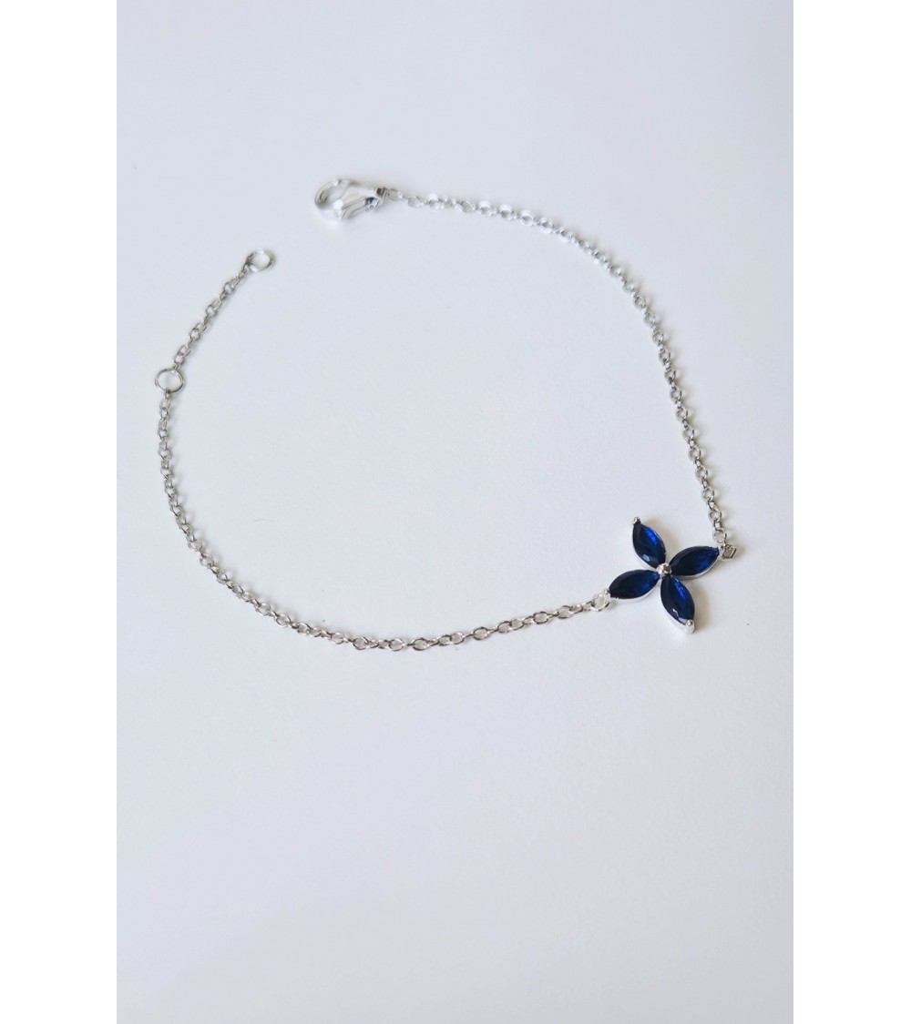 Bracelet "fleur" en argent 925/1000 rhodié et verre couleur bleu saphir