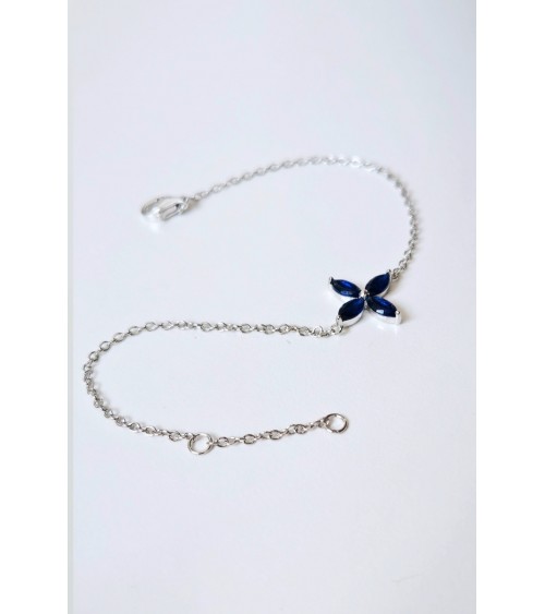 Bracelet "fleur" en argent 925/1000 rhodié et verre couleur bleu saphir
