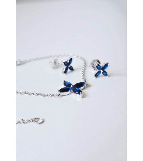 Bracelet "fleur" en argent 925/1000 rhodié et verre couleur bleu saphir