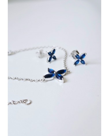 Bracelet "fleur" en argent 925/1000 rhodié et verre couleur bleu saphir