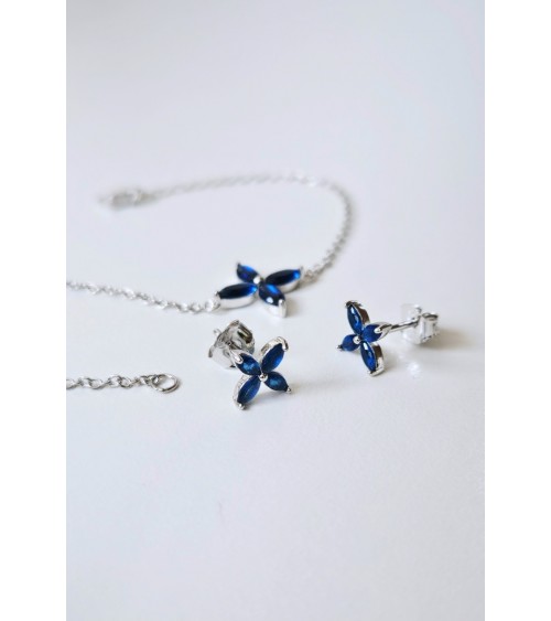 Bracelet "fleur" en argent 925/1000 rhodié et verre couleur bleu saphir