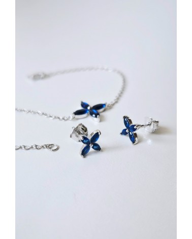 Bracelet "fleur" en argent 925/1000 rhodié et verre couleur bleu saphir