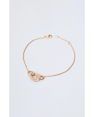 Bracelet en plaqué or avec trois maillons ovales entrelacés dont un avec oxyde de zirconium