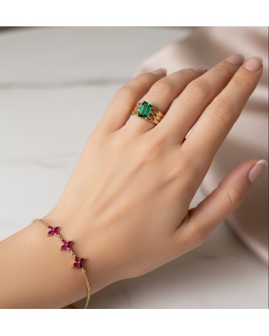Bague en plaqué or 3 anneaux fixes surmontés d'une pierre de synthèse couleur vert émeraude rectangulaire