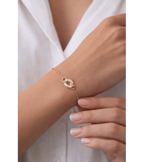 Bracelet en plaqué or avec trois maillons ovales entrelacés dont un avec oxyde de zirconium