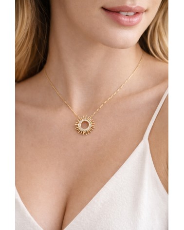 Collier "soleil" en plaqué or serti en son centre d'oxydes de zirconium