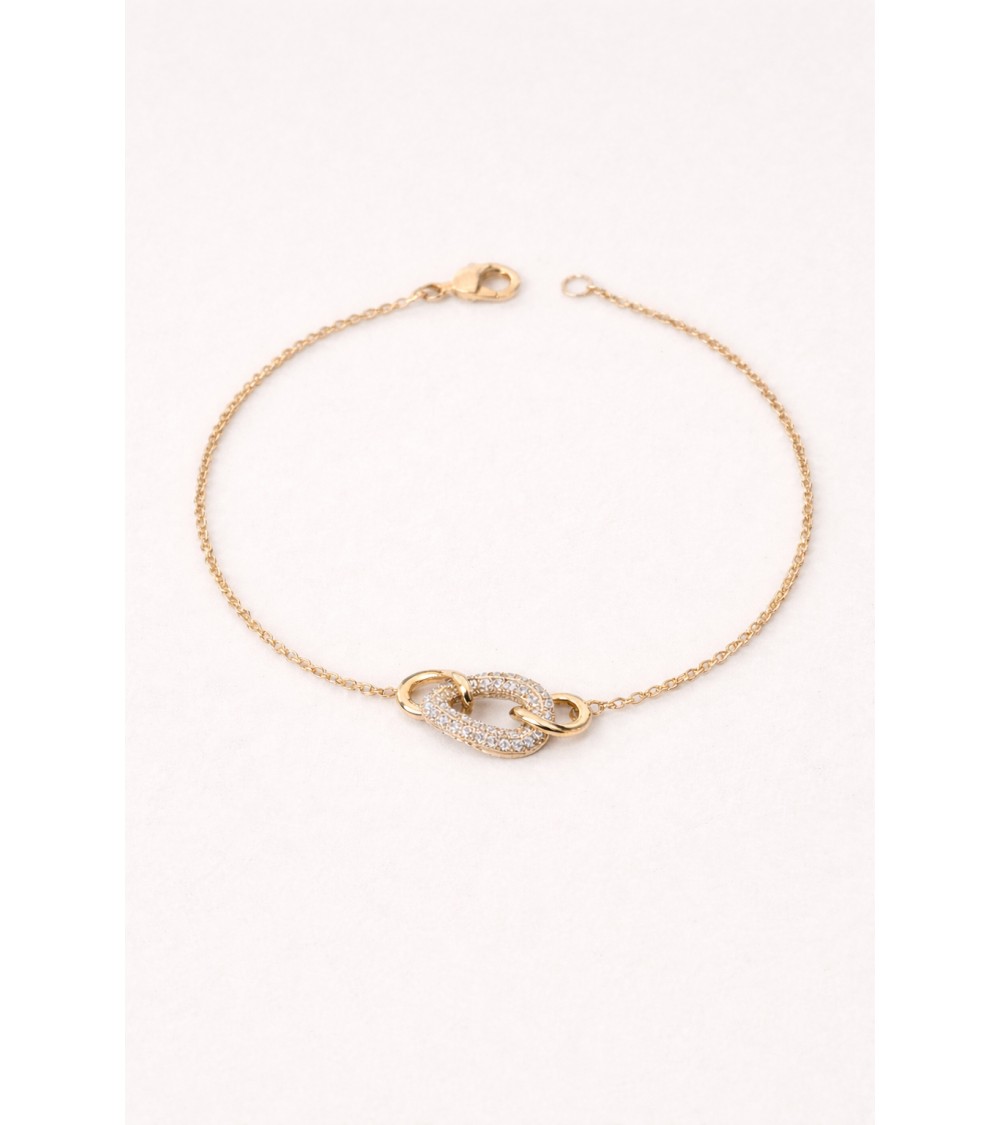 Bracelet en plaqué or avec trois maillons ovales entrelacés dont un avec oxyde de zirconium
