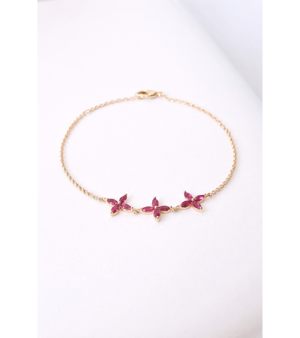 Bracelet en plaqué or et trio de fleurs en verre couleur fuchsia