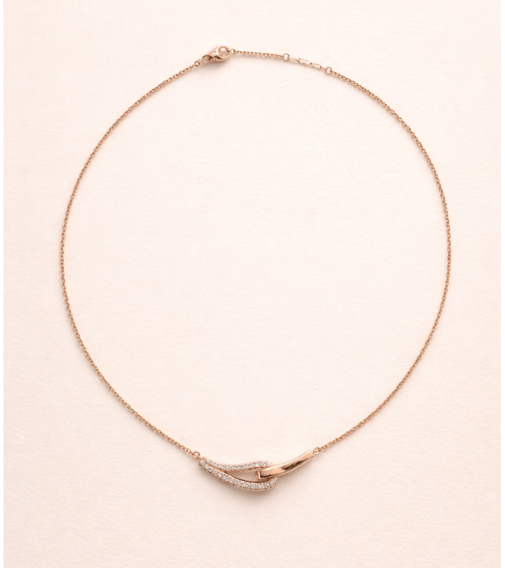 Collier forme double goutte en plaqué or, l'une lisse, l'autre sertie d'oxydes de zirconium