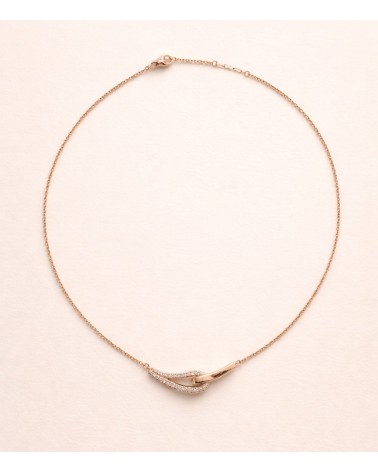 Collier forme double goutte en plaqué or, l'une lisse, l'autre sertie d'oxydes de zirconium