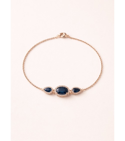 Bracelet en plaqué or avec un ovale et deux gouttes en verre couleur saphir, entourés d'oxydes de zirconium
