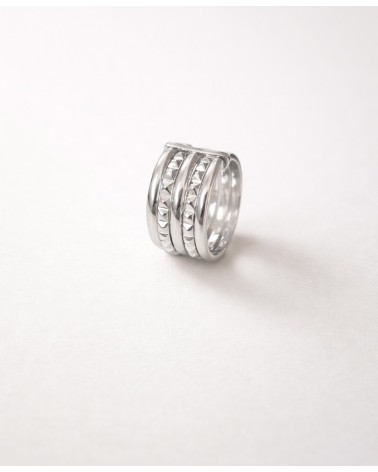 Bague en argent 925/1000 rhodié avec 3 anneaux lisses et 2 crantés reliés par une barre