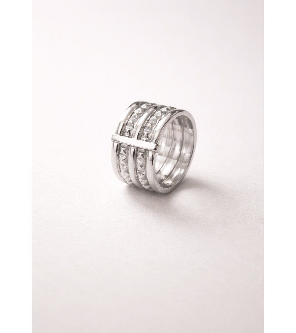 Bague en argent 925/1000 rhodié avec 3 anneaux lisses et 2 crantés reliés par une barre