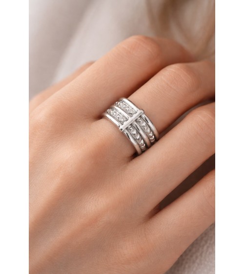 Bague en argent 925/1000 rhodié avec 3 anneaux lisses et 2 crantés reliés par une barre