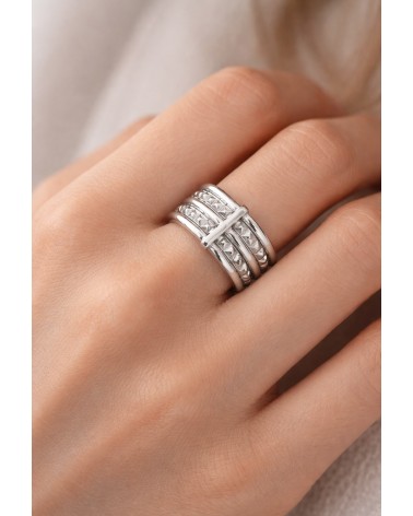 Bague en argent 925/1000 rhodié avec 3 anneaux lisses et 2 crantés reliés par une barre