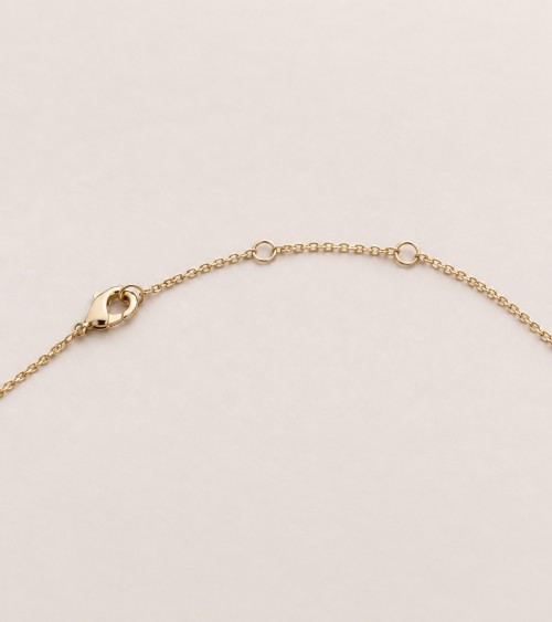 Collier amande en plaqué or, verre couleur rubis et oxydes de zirconium