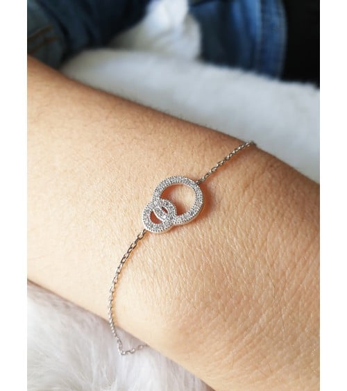 Gourmette double anneau entrelacé en argent 925/1000ème rhodié et oxydes de zirconium blancs