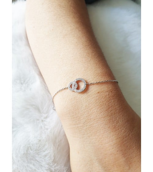 Gourmette double anneau entrelacé en argent 925/1000ème rhodié et oxydes de zirconium blancs