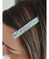 Pince à cheveux "croco" en métal argenté recouvert de paillettes argentées