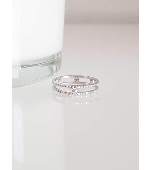 Bague double anneau picot en argent 925/1000 rhodié surmonté d'un oxyde de zirconium