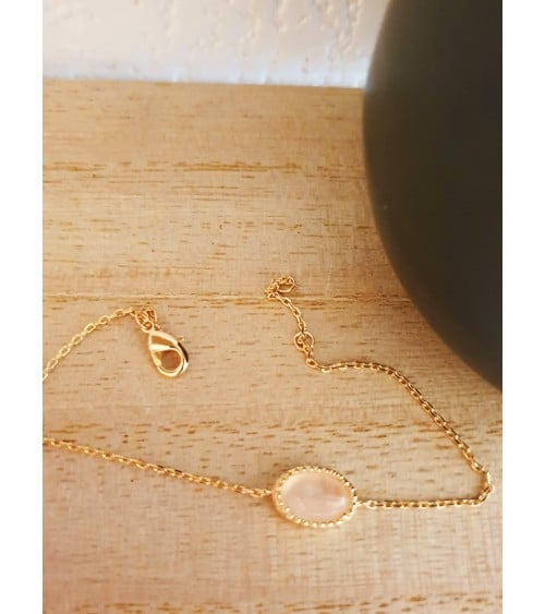 Bracelet en plaqué or avec un ovale en quartz, en longueur 18 cm réglable à 16 cm